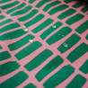 Coton coated with blue oil on pink - Calissone